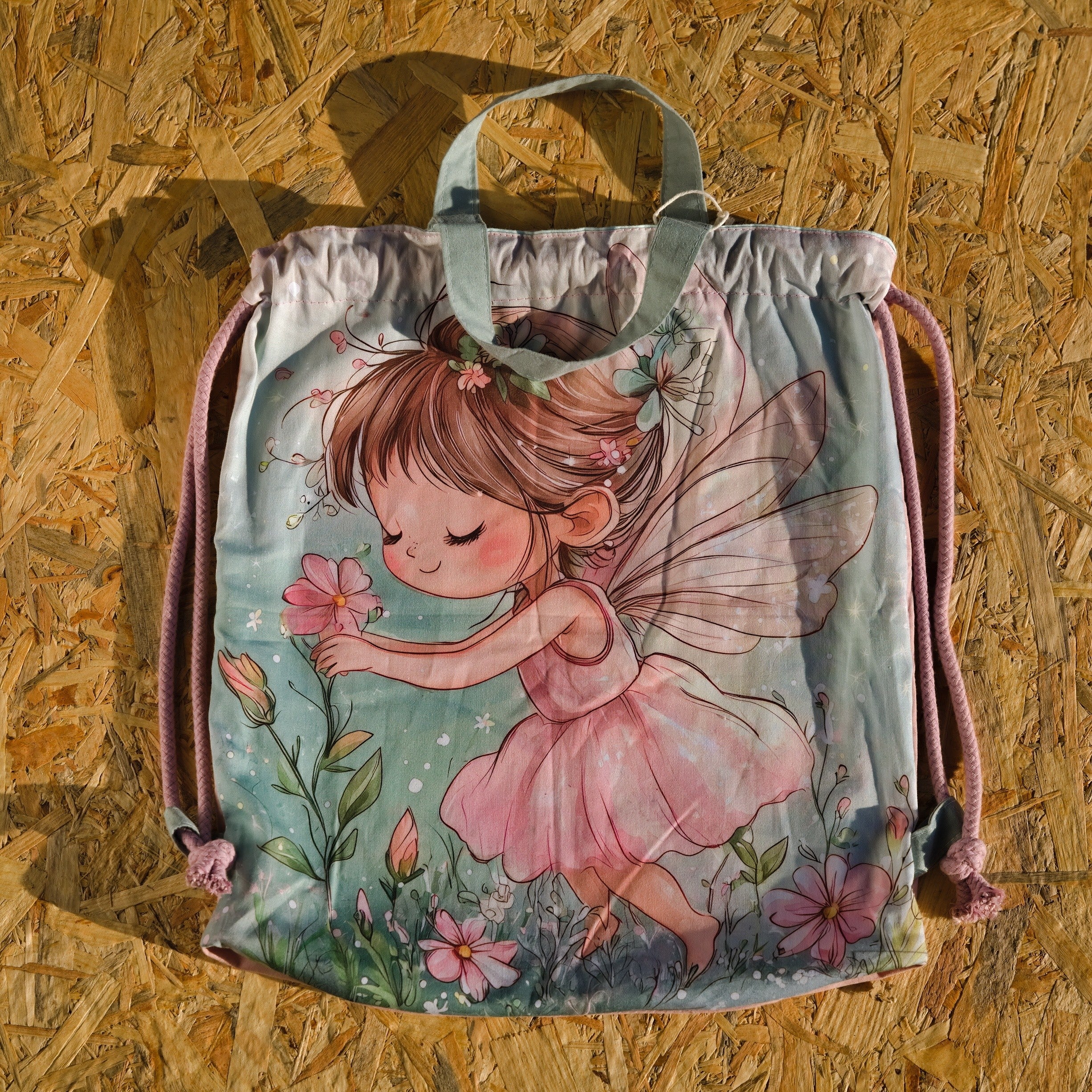 Green Drawstring Backpack With a Print of a Girl