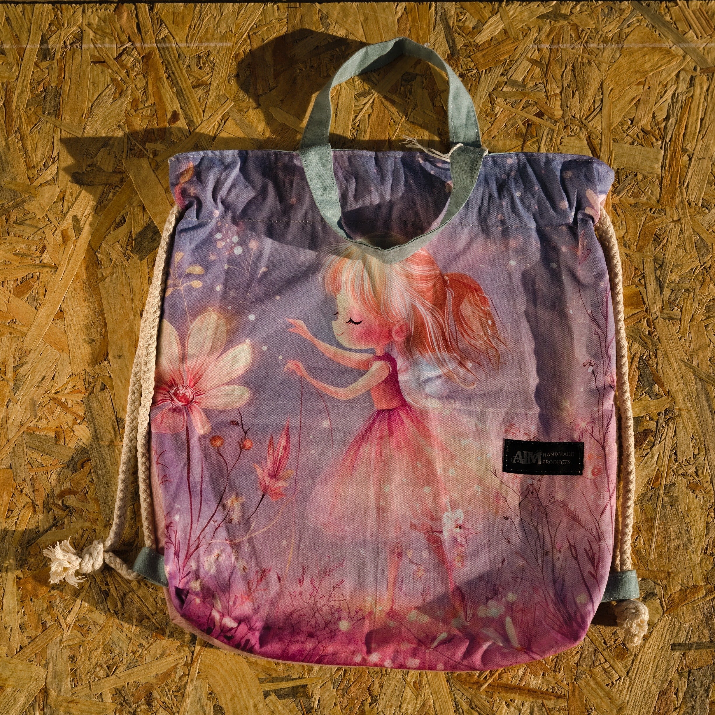 Purple Drawstring Backpack With a Print of a Girl