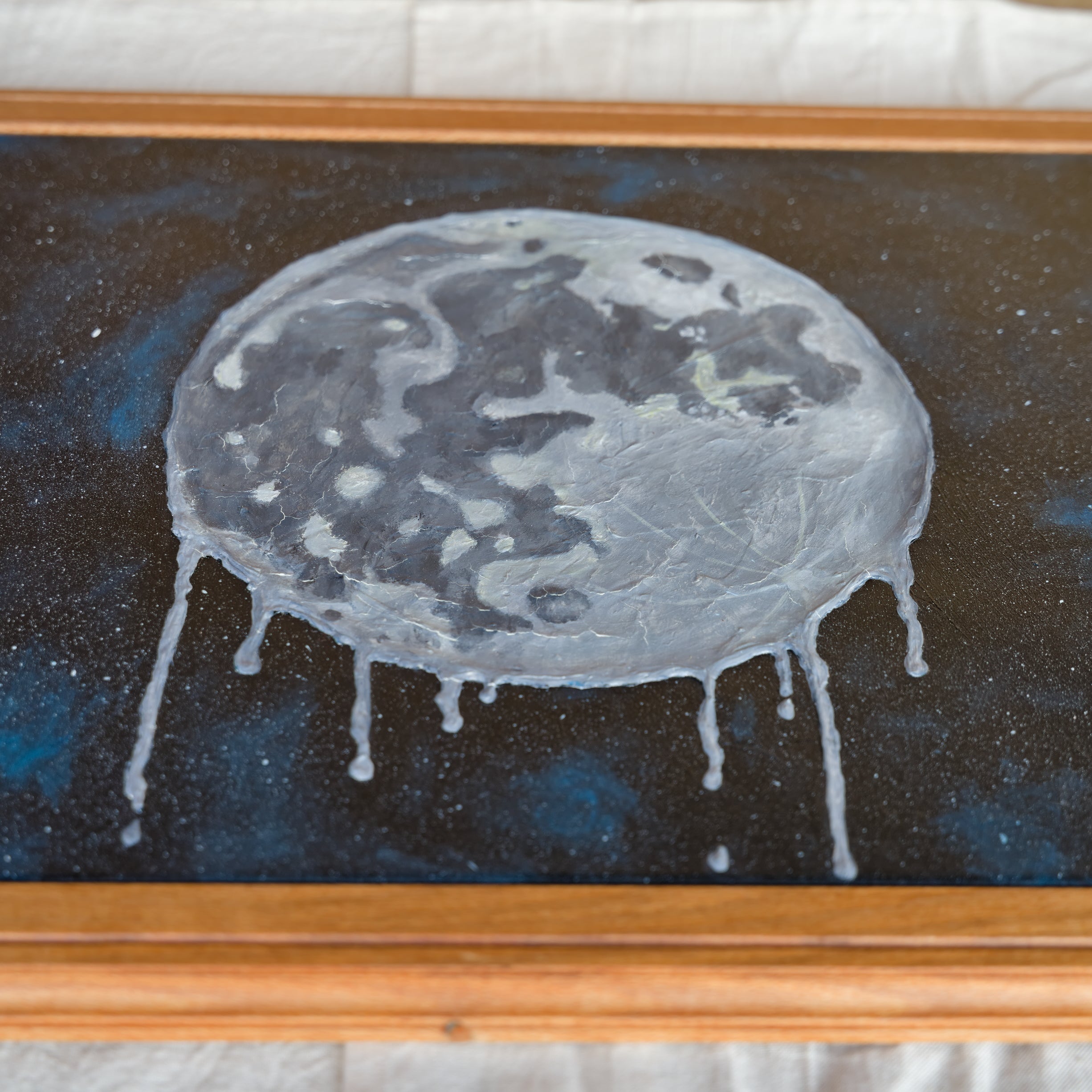 Melting Moon Canvas – Framed Space Art with Starry Night Background