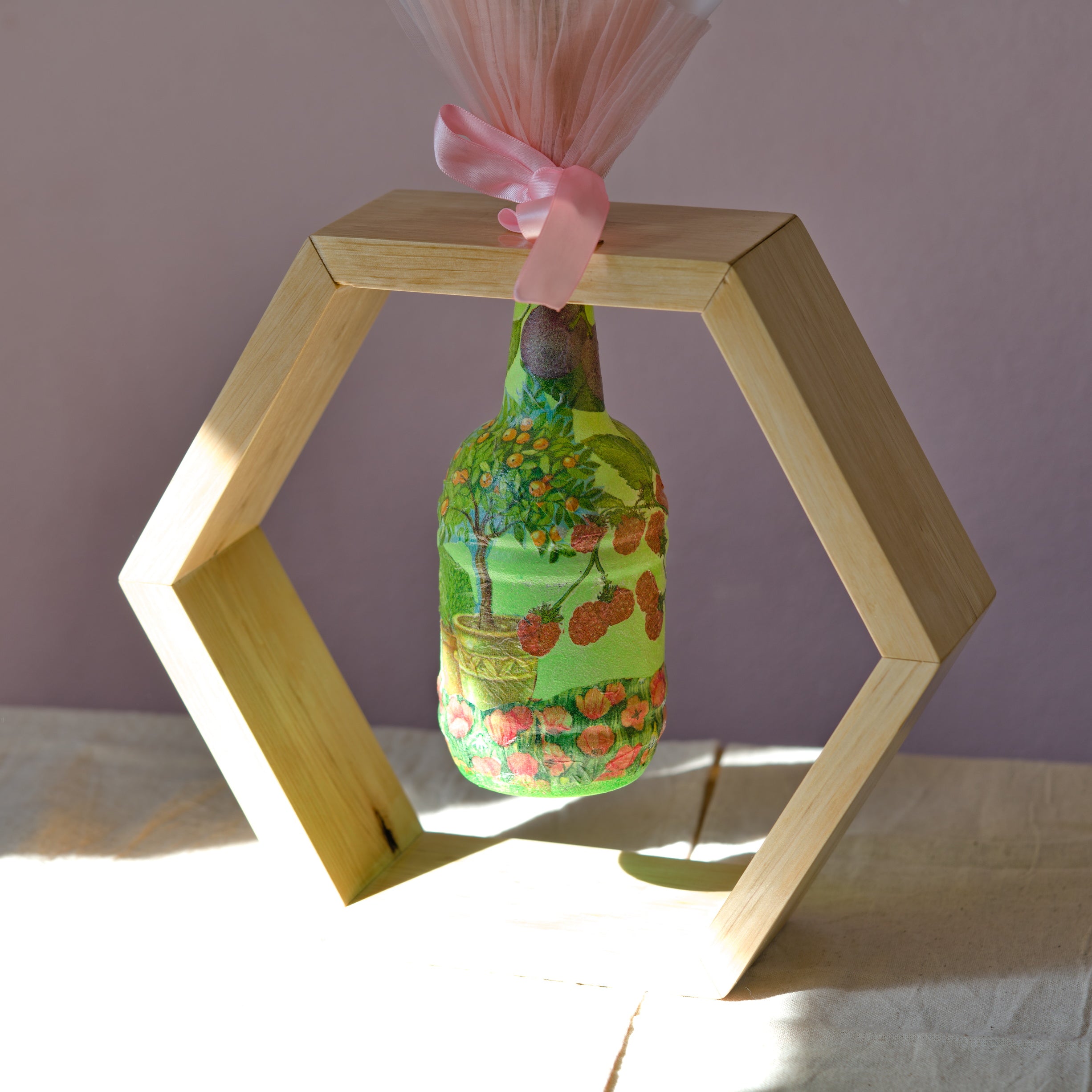 Hexagonal Floating Bottle Display with Decoupage Art